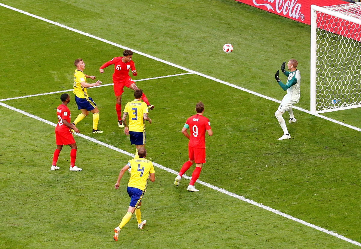 England's Dele Alli scores their second goal. Reuters photo