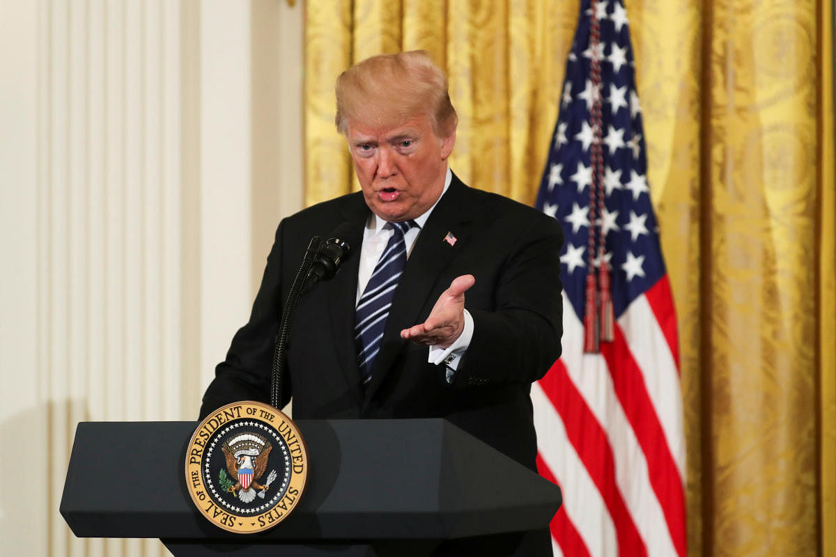 U.S. President Donald Trump gestures as he delivers remarks during the Prison Reform Summit at the White House in Washington, U.S., May 18, 2018. Reuters file photo