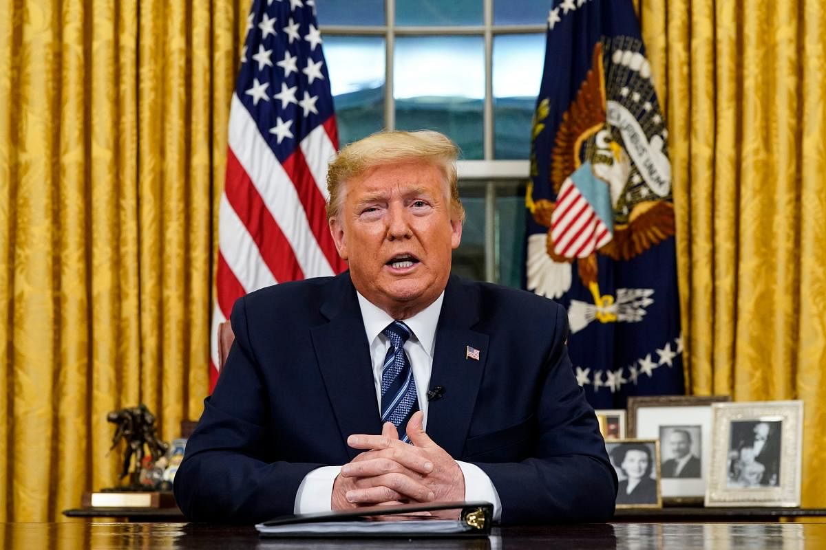 US President Donald Trump addresses the nation from the Oval Office about the widening novel coronavirus (Covid-19) crisis in Washington. (AFP Photo)