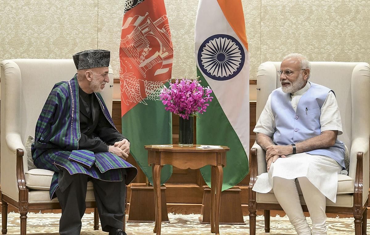 Prime Minister Narendra Modi with Afghanistan President Hamid Karzai during a meeting, in New Delhi, Monday, Aug 19, 2019. (PIB/PTI Photo)