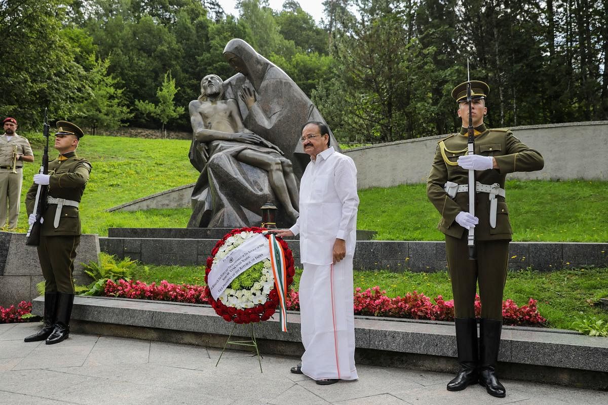 Vice President M Venkaiah Naidu pays homage to the fallen heroes of the Lithuanian Struggle for Independence at a cemetery in Vilnius, Lithuania, Monday, August 19, 2019. (PTI Photo)