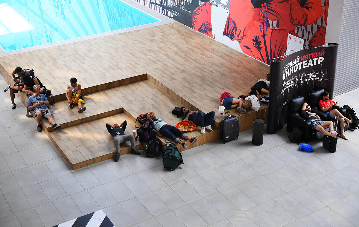 A group of Mexico football fans sleep inside a shopping mall in Samara, Russia. (Reuters Photo)