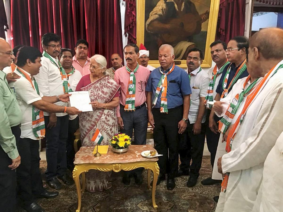Congress delegation led by Chandrakant Kavlekar meets Goa governor Mridula Sinha to stake claim to form government in the state on the grounds of being the single largest party in the Legislative Assembly, in Panaji, on Friday. PTI Photo