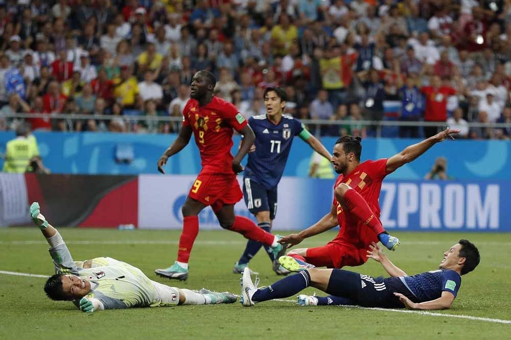 Belgium's Nacer Chadli, second right, scores his side's third goal past Japan goalkeeper Eiji Kawashima, left, during the round of 16 match between Belgium and Japan at the 2018 soccer World Cup in the Rostov Arena, in Rostov-on-Don, Russia, Monday, July 2, 2018. Chadli scored once in Belgium's 3-2 victory.AP/PTI Photo