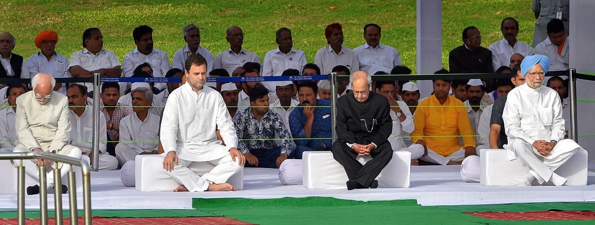 Congress President Rahul Gandhi with former president Pranab Mukherjee, former vice-president Hamid Ansari and former prime minister Manmohan Singh after paying tribute to India's first prime minister Pandit Jawaharlal Nehru on his 54th death anniversary, at Shanti Van, in New Delhi, on Sunday. PTI Photo