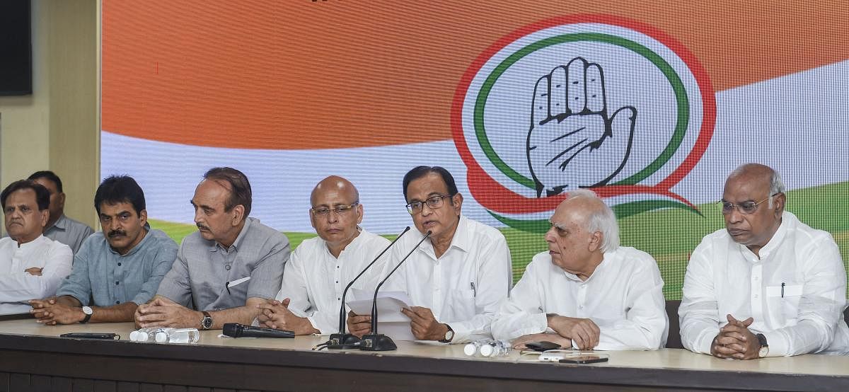 Congress leader P Chidambaram addressing a press conference with party leaders Kapil Sibal, Abhishek Singhvi, Mallikarjun Kharge, Ghulam Nabi Azad, Ahmed Patel and KC Venugopal at AICC HQ, in New Delhi, Wednesday, Aug 21, 2019. (PTI)