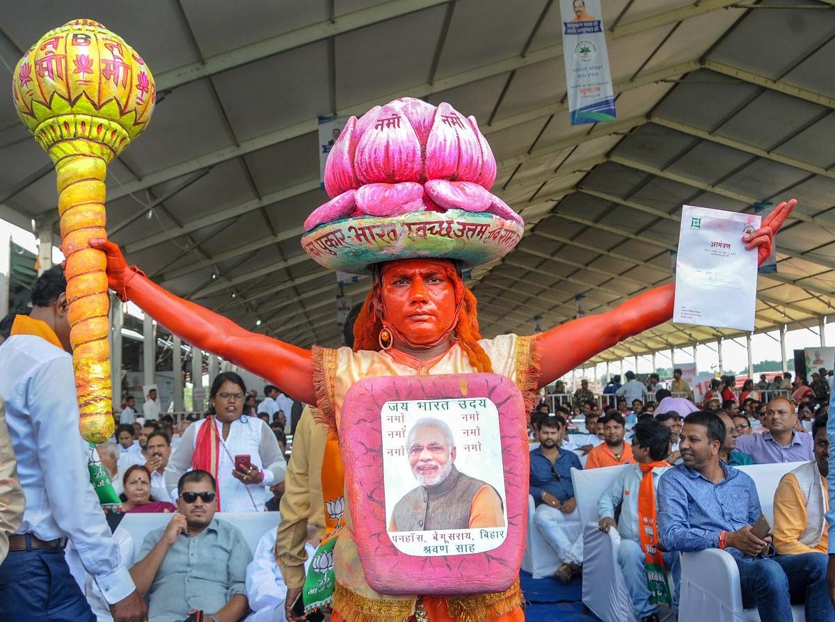 Ranchi: A BJP supporter dressed like Lord Hanuman poses for photos during the launch of Ayushman Bharat-National Health Protection Mission (AB-NHPM) by Prime Minister Narendra Modi, in Ranchi, Sunday, Sept 23, 2018. (PTI Photo)