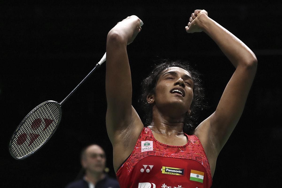 Pusarla V. Sindhu of India reacts after beating Akane Yamaguchi of Japan in their women's badminton semifinal match at the BWF World Championships in Nanjing, China. AP/PTI photo