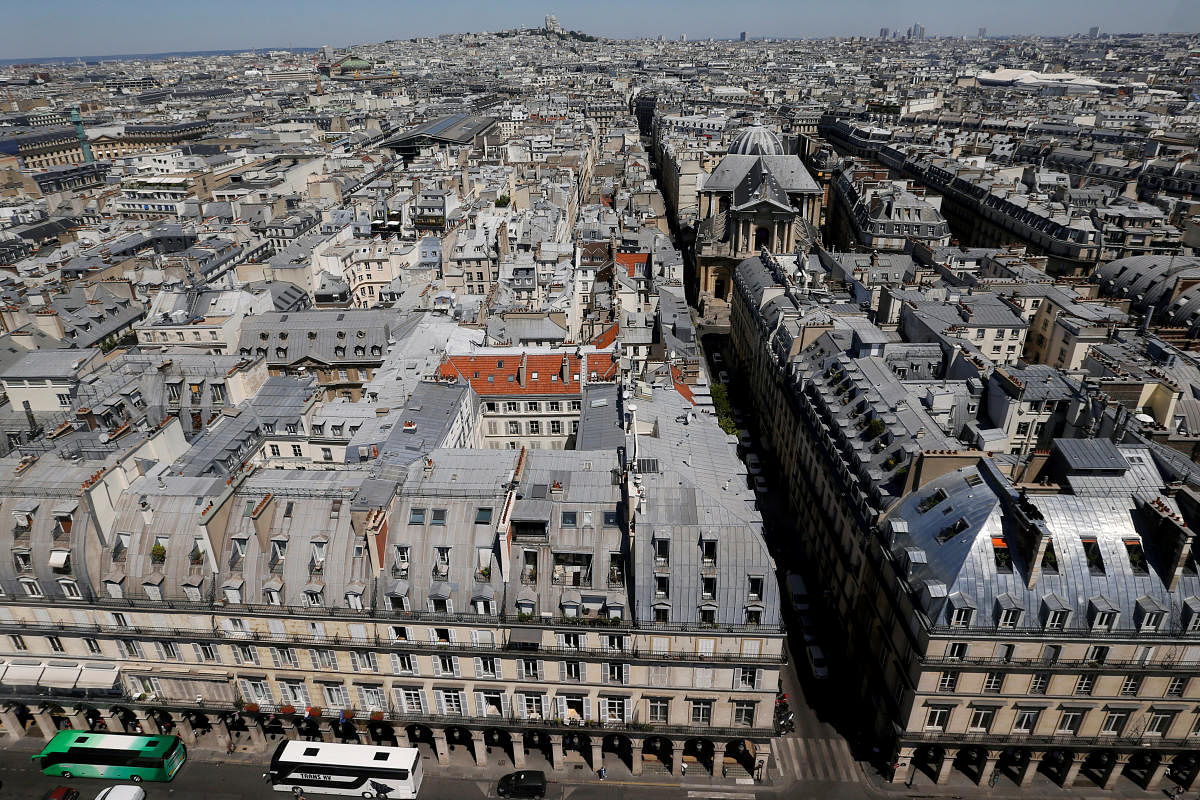 A view shows rooftops of buildings and the Sacre Coeur Basilica in the Paris skyline, France. (Reuters Photo)