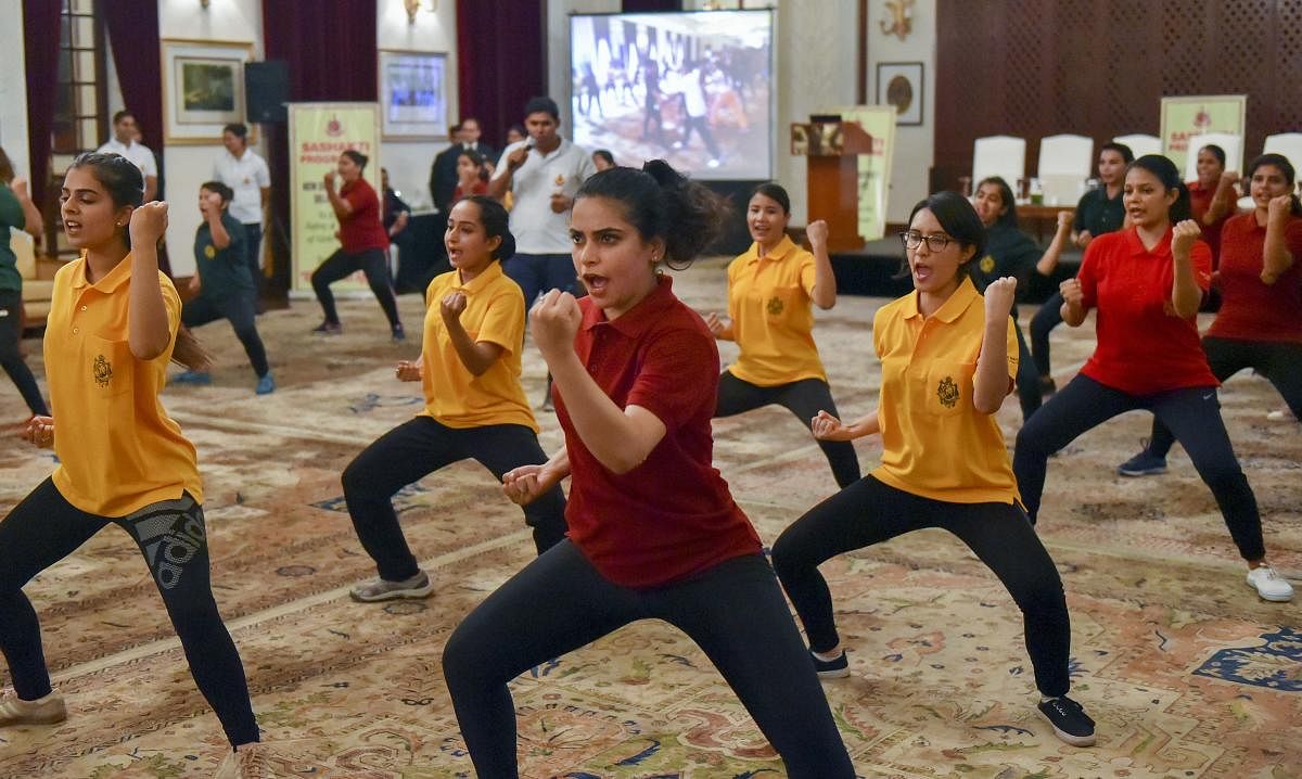 Participants show their skills during grand finale of a self defense workshop, organised by the Delhi Police, in New Delhi, Monday, Sept. 09, 2019. (PTI Photo)