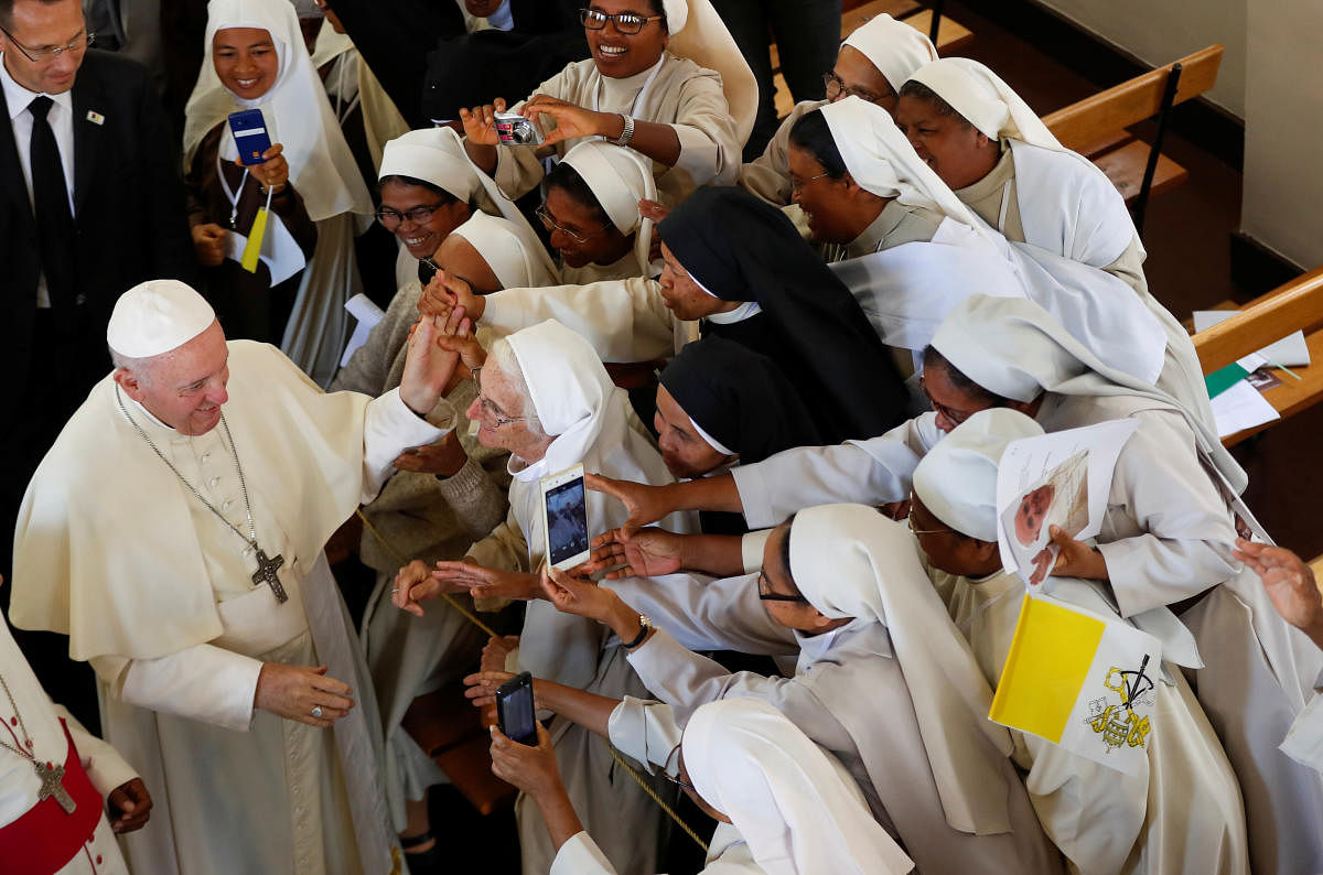 Pope Francis greets faithful after leading the mid-morning prayer at the Monastery of the Discalced Carmelites in Antananarivo, Madagascar, September 7, 2019. REUTERS/Yara Nardi
