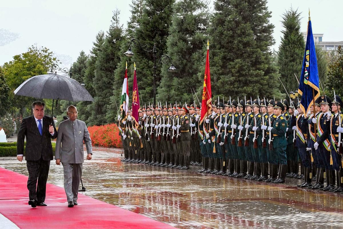 President Ram Nath Kovind with Tajik counterpart Emomali Rahmon inspects a guard of honour during his ceremonial welcome at Palace of Nation, Dushanbe, Tajikistan. (PTI photo)