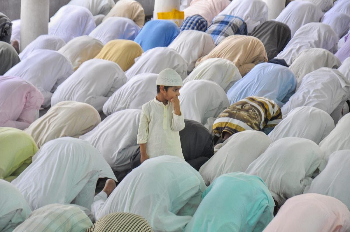Muslims offer 'namaz' on the second Friday of the holy month of Ramadan, in Moradabad.PTI Photo