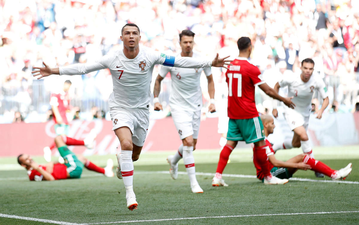 Soccer Football - World Cup - Group B - Portugal vs Morocco - Luzhniki Stadium, Moscow, Russia - June 20, 2018 Portugal's Cristiano Ronaldo celebrates scoring their first goal REUTERS