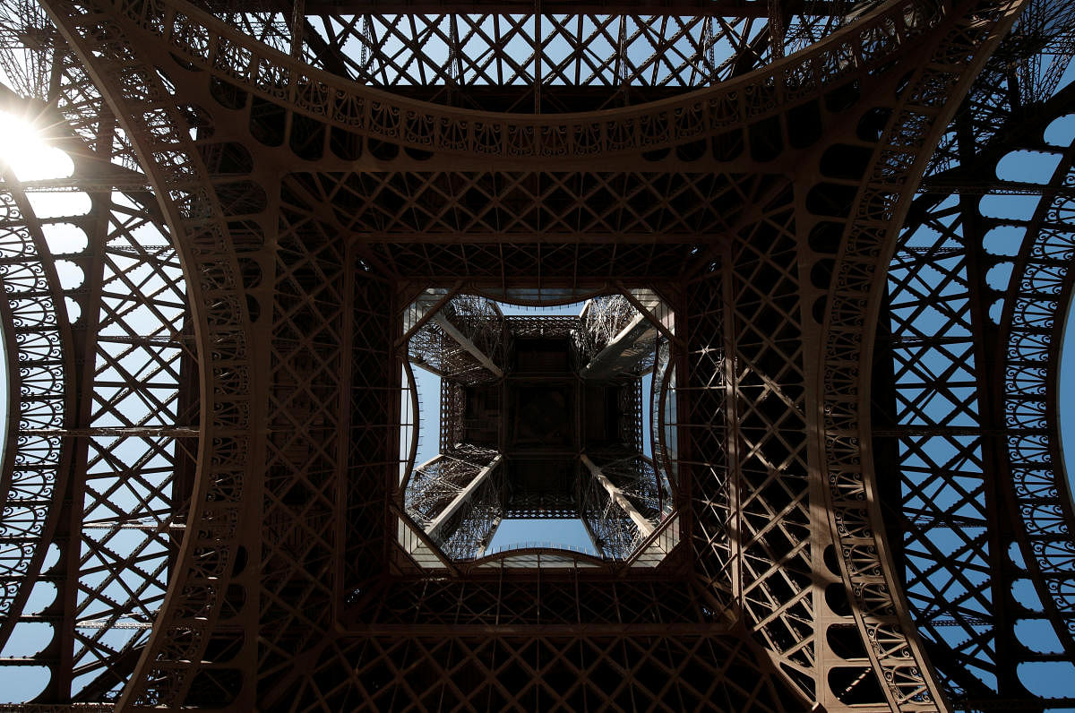 The Eiffel Tower is seen from below on a summer day in Paris, France, August 2, 2018. REUTERS/Benoit Tessier