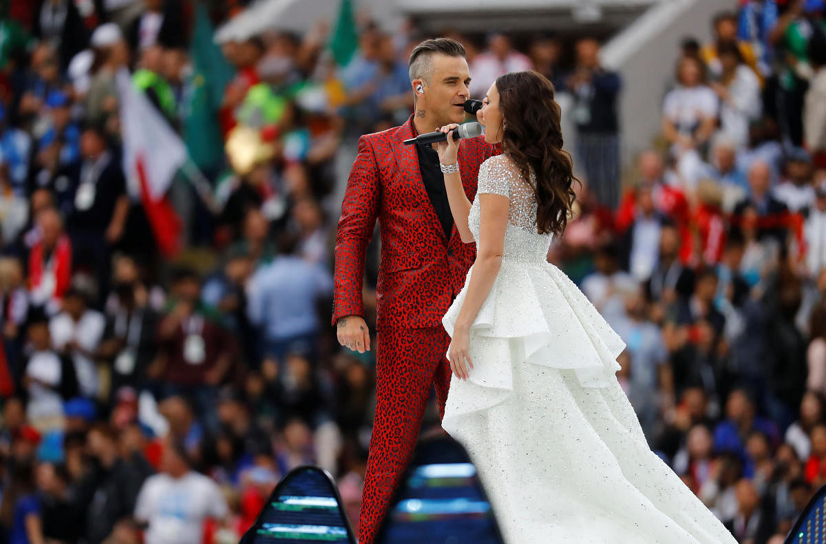 World Cup - Group A - Russia vs Saudi Arabia: Robbie Williams and Aida Garifullina perform during the opening ceremony in Luzhniki Stadium, Moscow, Russia. REUTERS