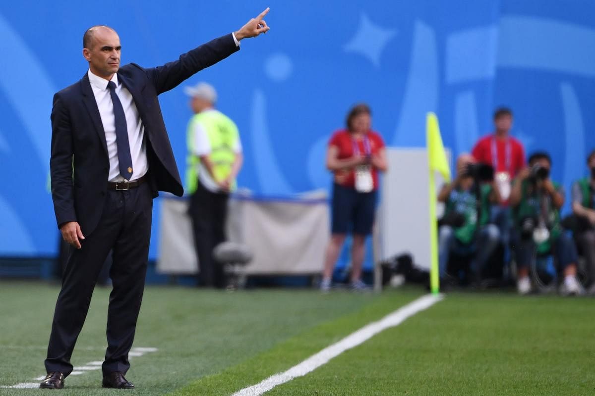 Belgium's coach Roberto Martinez gestures during their Russia 2018 World Cup play-off for third place football match between Belgium and England at the Saint Petersburg Stadium in Saint Petersburg. AFP  Photo