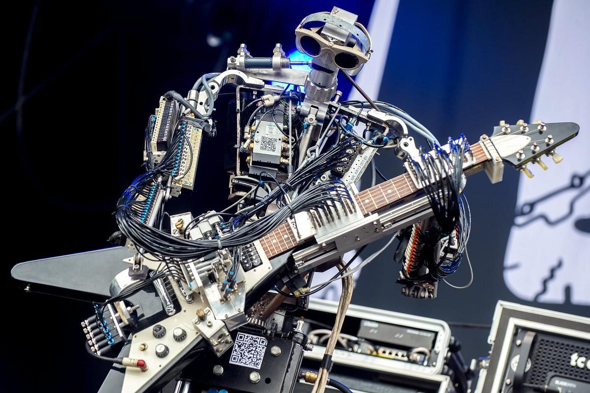 A robot guitarist from the robot band 'Compressorhead' performs during the 2018 Cebit digital fair in Hannover, Germany. PTI Photo