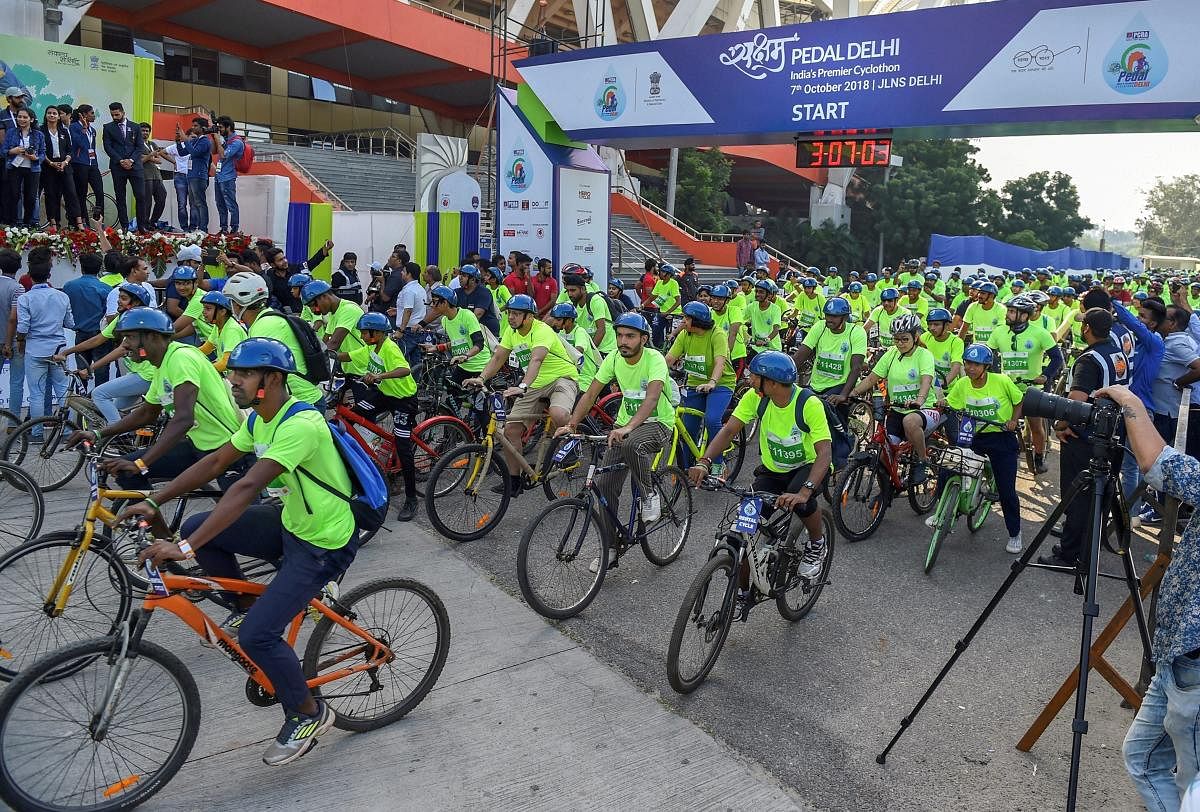 Participants during the second edition of 'Saksham Pedal Delhi', a cyclothon organised by Petroleum Conservation Research Association (PCRA) to propagate the importance of fuel conservation, at Jawaharlal Nehru Stadium in New Delhi on Sunday. (PTI Photo)