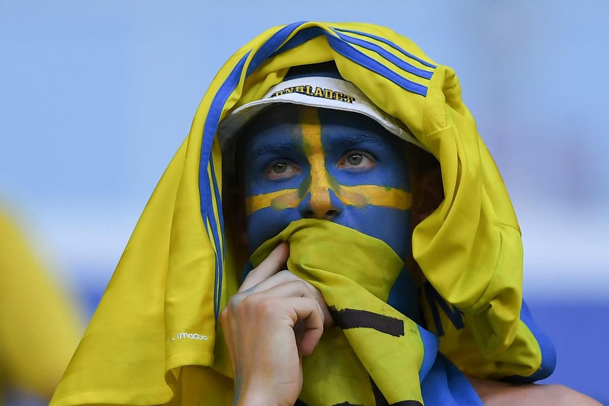 A Sweden fan reacts at the end of the Russia 2018 World Cup quarter-final football match between Sweden and England at the Samara Arena in Samara. AFP photo