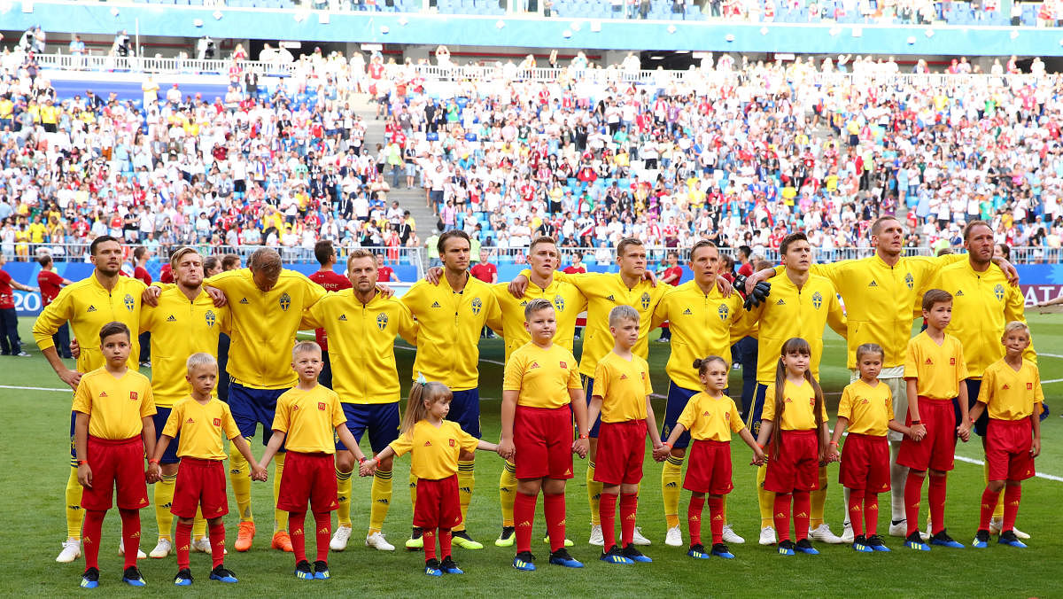 Sweden players lined up before the match. Reuters photo