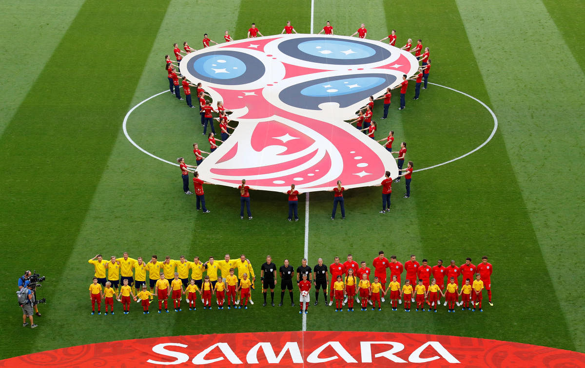 Sweden and England players line up during the national anthems before the match. Reuters photo