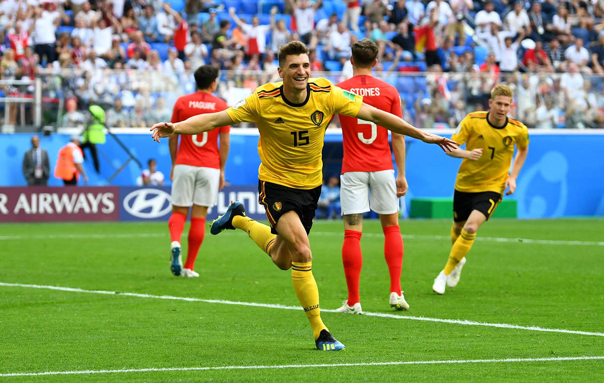 Belgium's Thomas Meunier celebrates scoring their first goal. Reuters  Photo