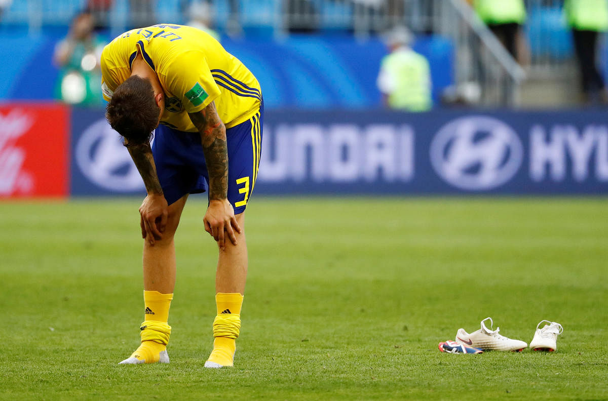 Sweden's Victor Lindelof looks dejected after the match. Reuters