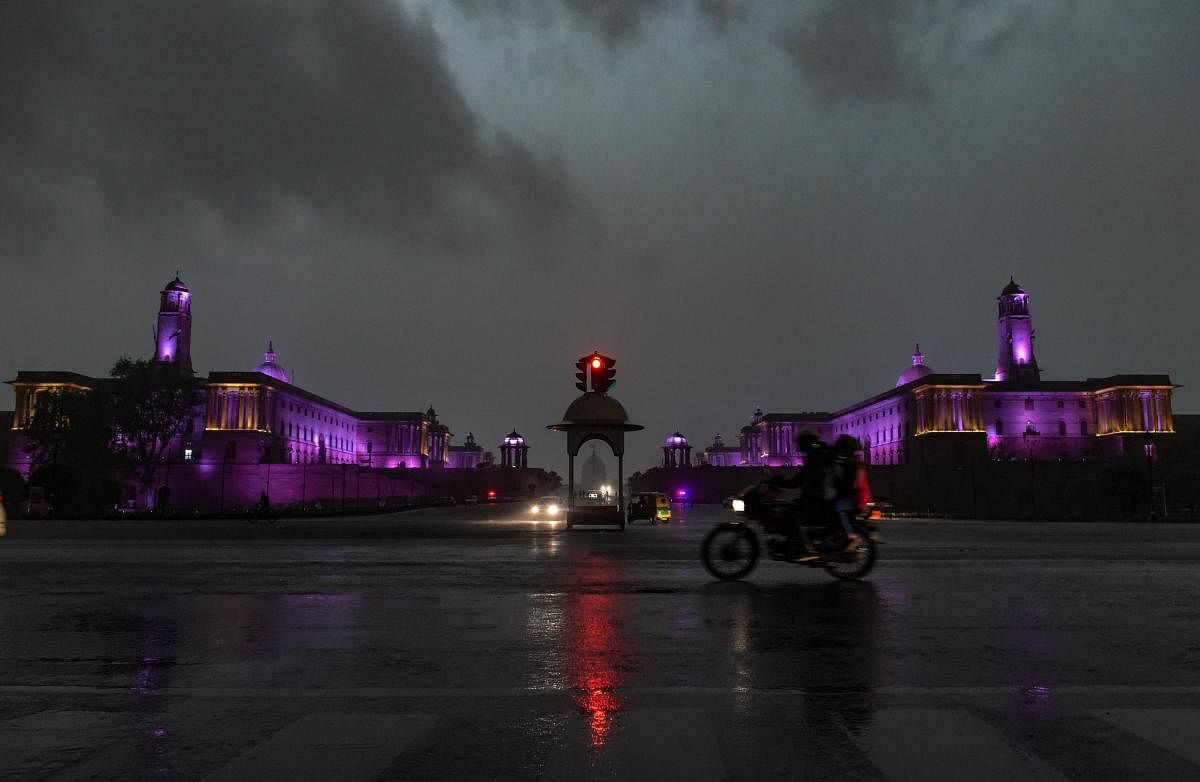 A view of the Vijay Chowk and Raisina Hill during a thunderstorm, in New Delhi on Saturday, June 09, 2018. The dust storm followed by rains and thunderstorm brought much needed respite to the capital city which was under the spell of hot and humid weather.  PTI Photo
