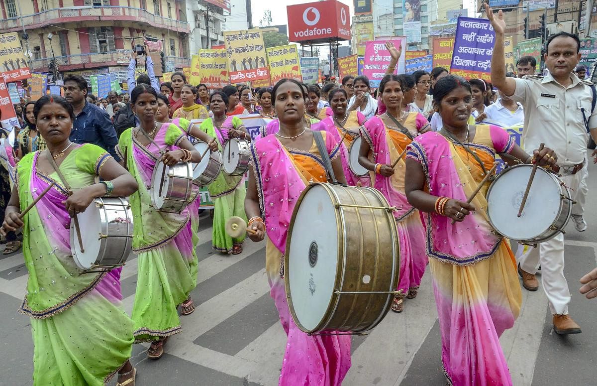 Women activists take out a Raj Bhawan march during a protest against the atrocities of Women, in Patna on Monday. PTI Photo