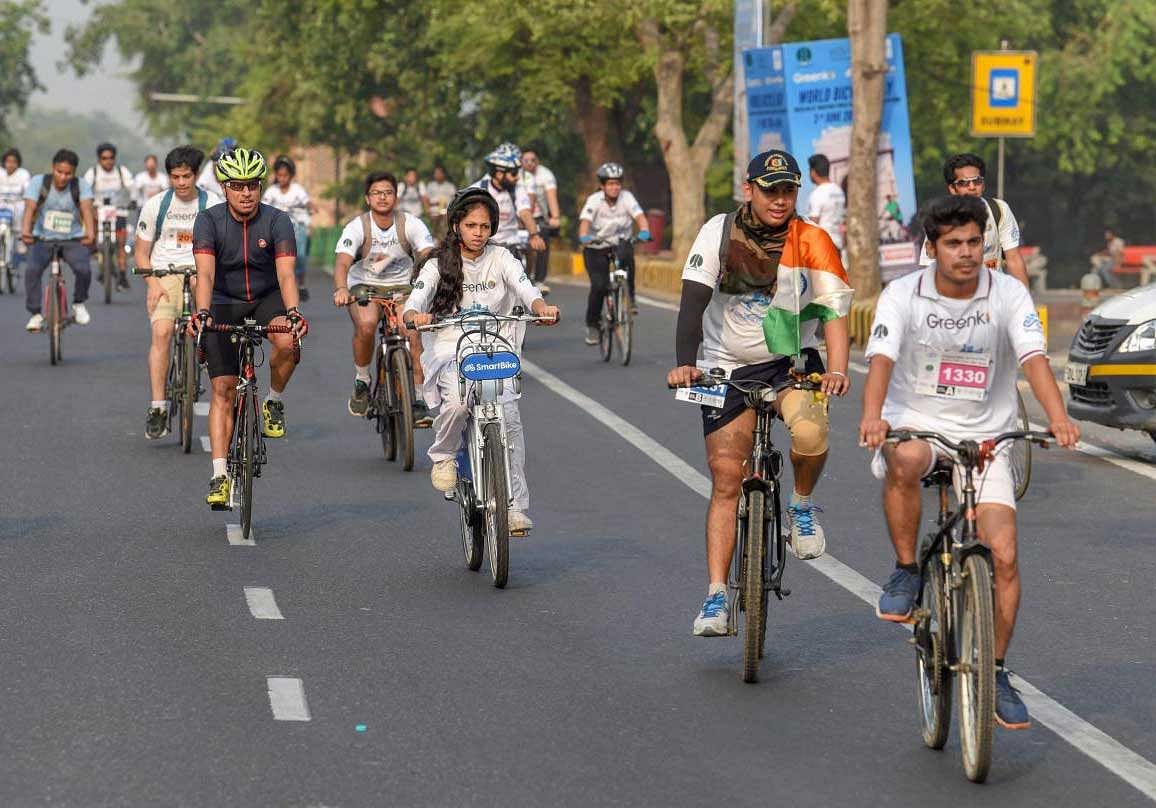 People participate in a bicycle rally as a part of World Bicycle Day on the occasion of World Bicycle Day 2018, in New Delhi, on Sunday, June 03, 2018. PTI Photo