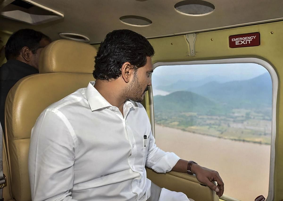Andhra Pradesh Chief Minister YS Jaganmohan Reddy conducts an aerial survey on Godavari River at Devipatnam mandal where boat mishap occurred in East Godavari district, Monday, Sept. 16, 2019. (PTI Photo)