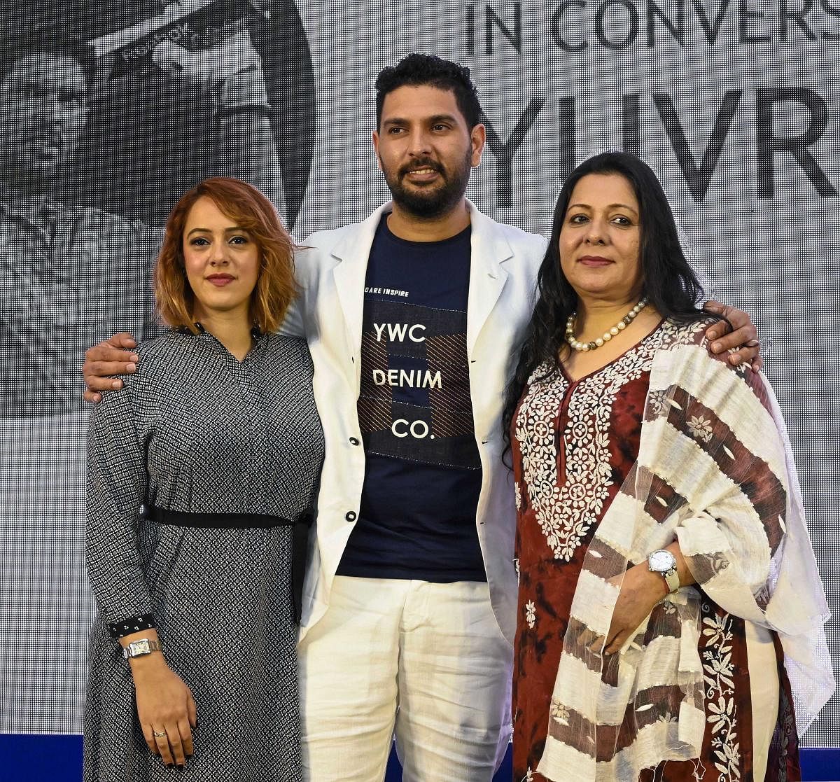 Cricketer Yuvraj Singh with his mother Shabnam and wife Hazel Keech at the event 'In Conversation With Yuvraj Singh' in Mumbai, Monday, June 10, 2019. Singh has announced his retirement from international cricket. (PTI Photo/Shirish Shete)