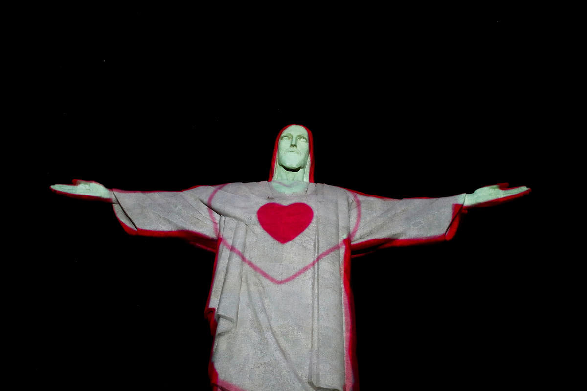 A form of heart is reflected on Christ the Redeemer to raise awareness on the hunger crisis hitting the country, as the spread of the coronavirus disease (COVID-19) continues, in Rio de Janeiro, Brazil. Credit: Reuters Photo