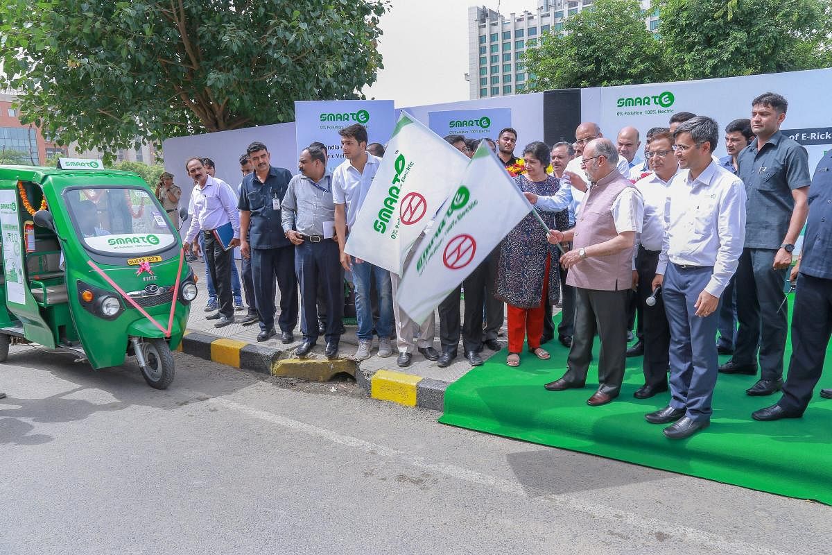 Delhi Lt. Governor Anil Baijal flags off a fleet of 100 e-rickshaws called SmartE from Dwarka Sec-10 Metro station, to boost the last mile connectivity service in Dwarka sub-city for Metro commuters, in New Delhi. PTI Photo