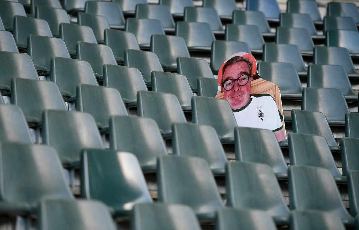 German football authorities are set to announce plans on April 23, 2020 for Bundesliga matches to restart on May 9 in empty stadiums, but the potential return in the midst of the coronavirus pandemic is meeting some opposition. (Photo by AFP)