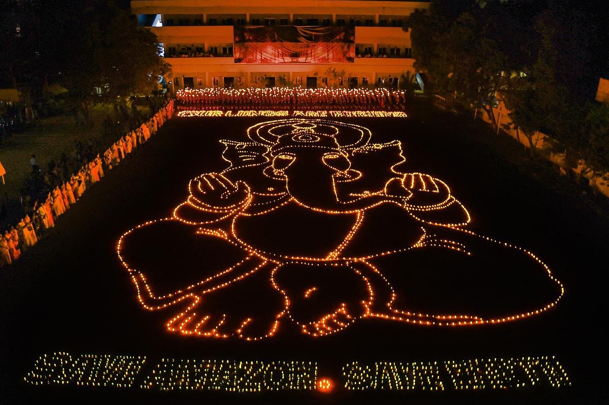 Around 2,000 students of a city-based school formed an image of Lord Ganesha with lamps seeking his blessings to stop the fire raging in the forests in Amazon at an event in Chennai, Saturday, Aug 31.2019, (PTI Photo)