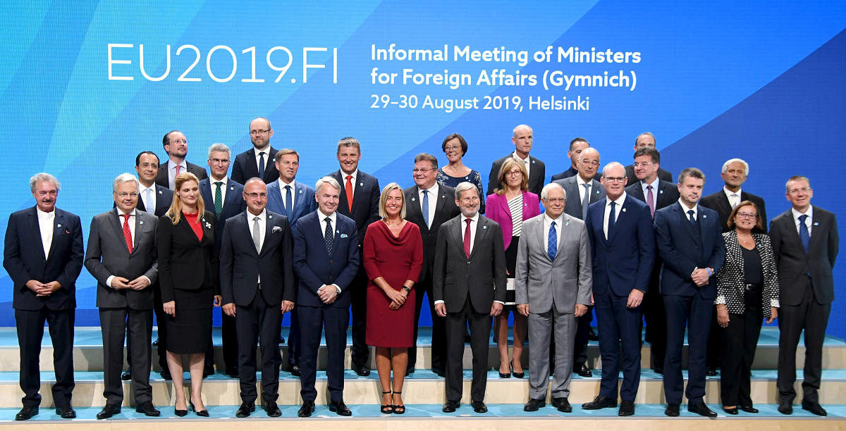 Ministers pose for a group photo during the informal meeting of EU foreign ministers in Helsinki, Finland August 29, 2019. Lehtikuva/Markku Ulander/via REUTERS