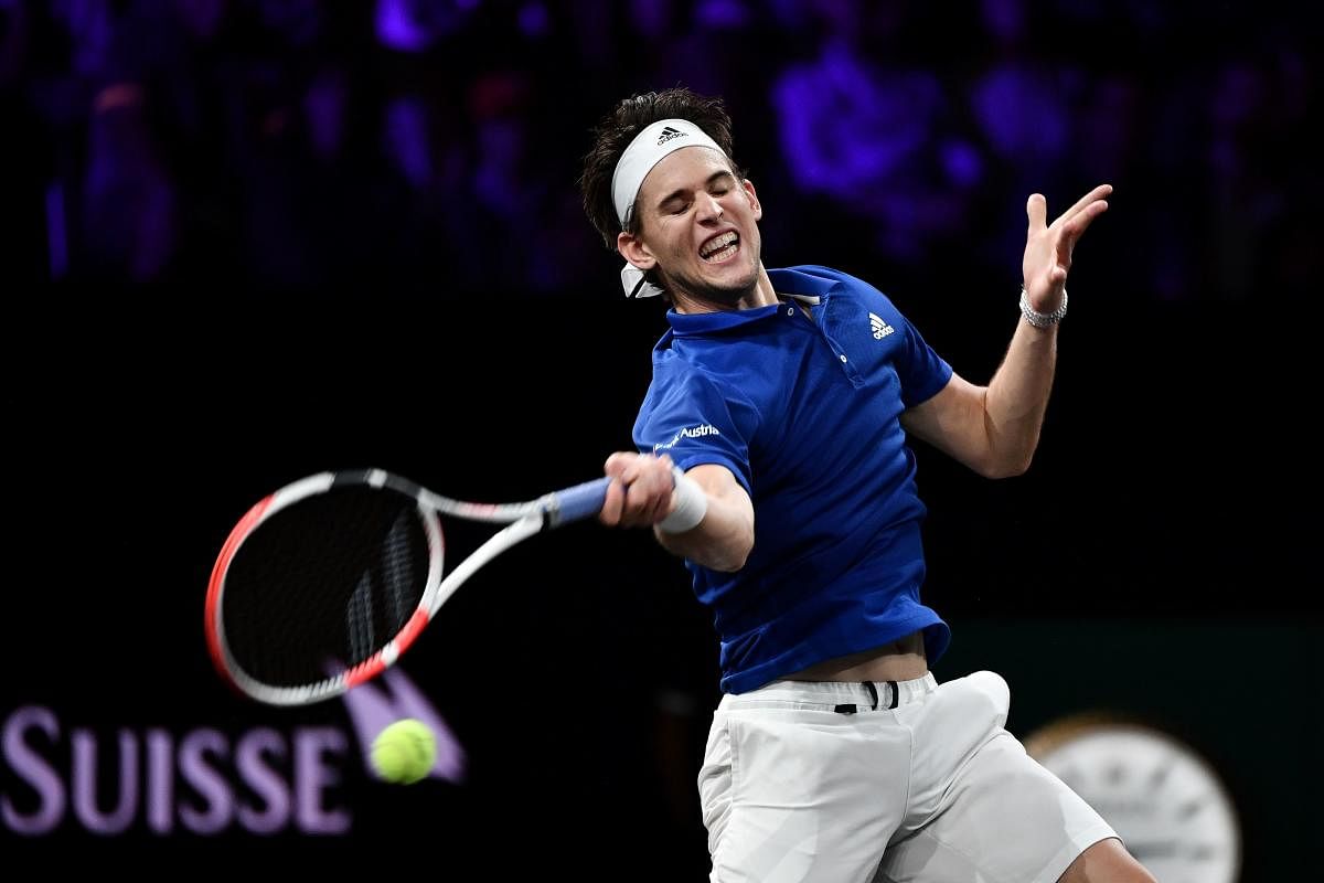 Team Europe's Dominic Thiem returns a ball to team World's Denis Shapovalov during their match as part of the 2019 Laver Cup tennis tournament in Geneva, on September 20, 2019. (Photo by Fabrice COFFRINI / AFP)