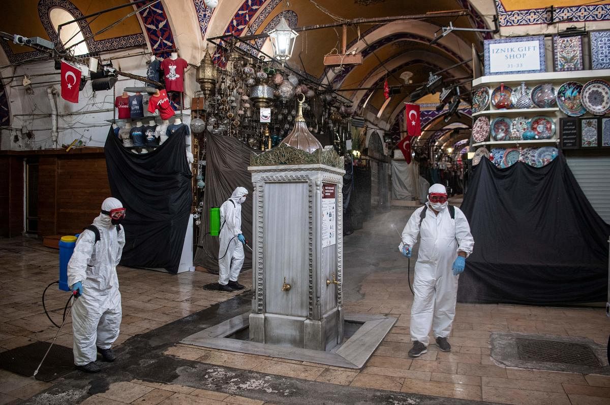 Municipal workers disinfect the iconic Grand Bazaar in Istanbul to prevent the spread of the COVID-19, caused by the novel coronavirus
