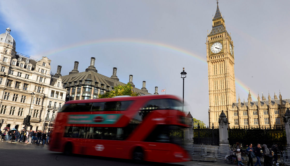 A rainbow is seen behind the Big Ben clock tower, at the Houses of Parliament in central London, Britain, October 16, 2016. (Credit: Reuters Photo)