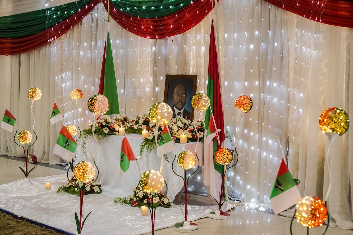 The portrait of Burundi's President Pierre Nkurunziza who died at the age of 55 is set on an altar during the memorial service by Burundi's ruling party. Credit: AFP Photo