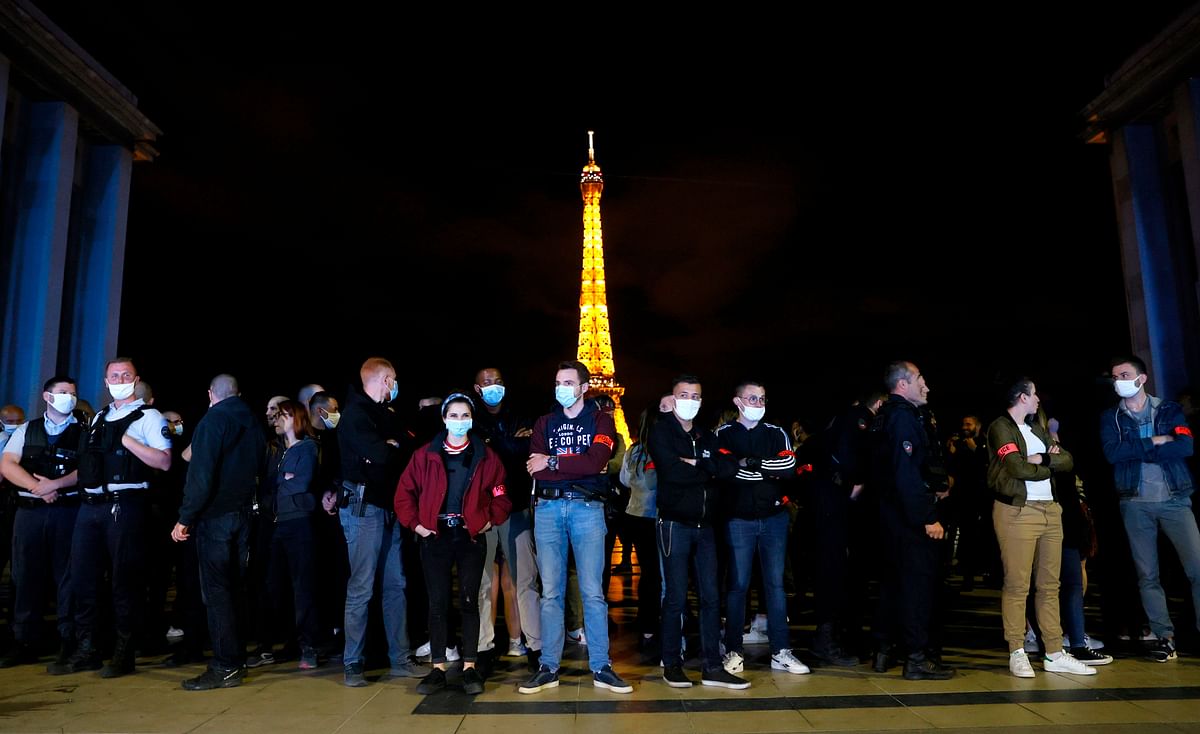 French police officers protest at Trocadero square in front of the Eiffel Tower in Paris on June 14, 2020, in reaction to the French Interior Minister's latests announcements following demonstrations against police violence. Credit: AFP Photo