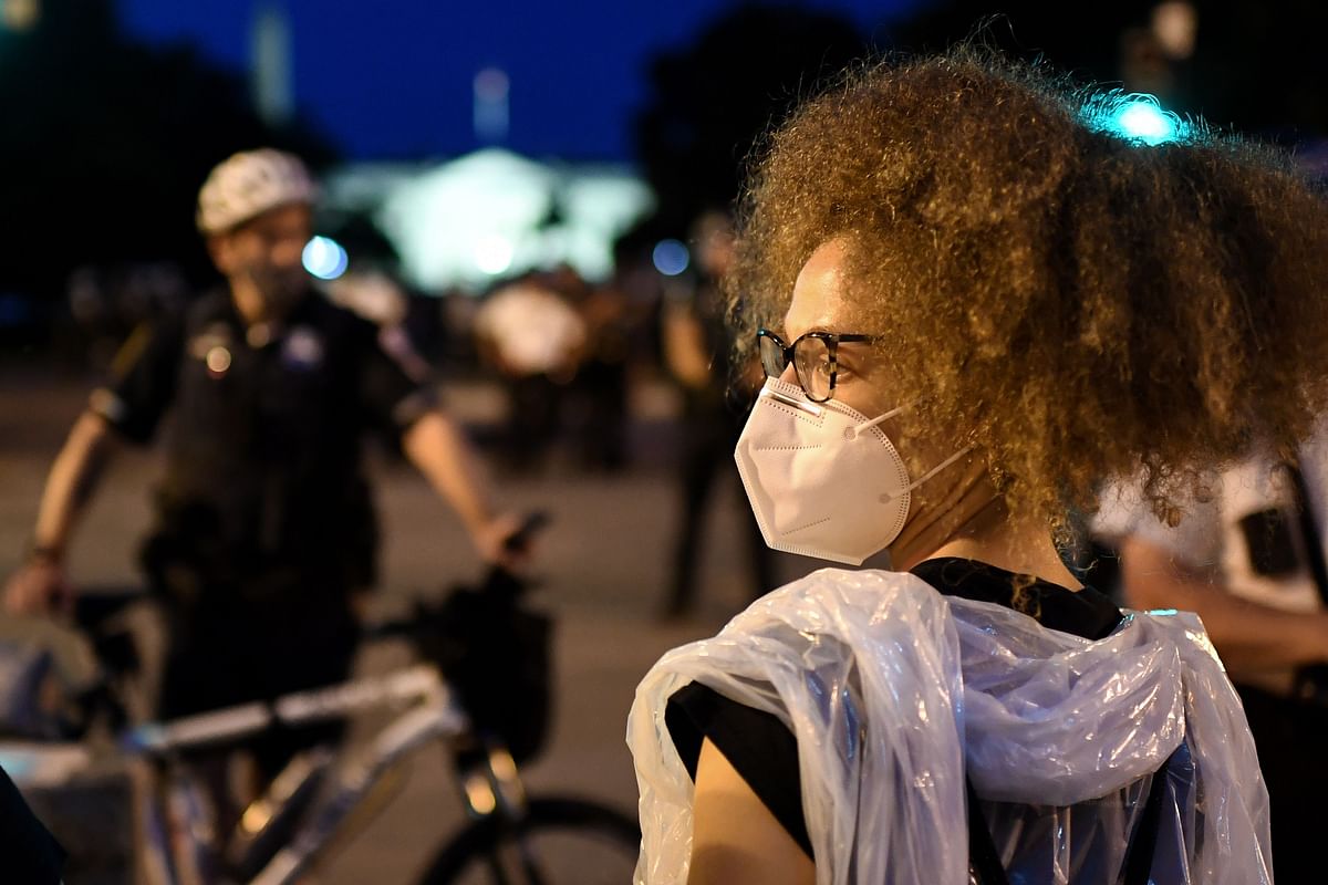 Protesters confront a row of police officers at Lafayette square, in front of the White House, in Washington, DC on June 22, 2020. - The United States is grappling with widespread protests against racial inequality. Credits: AFP Photo