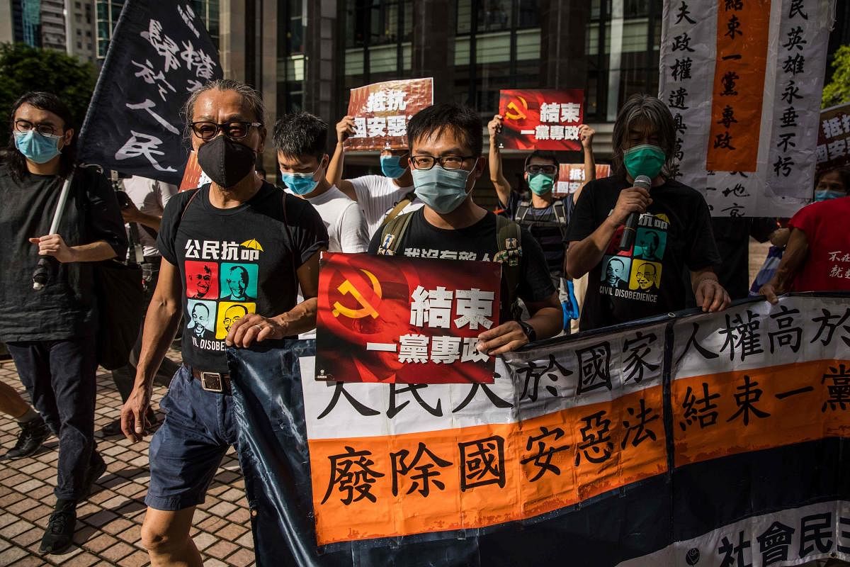 Pro-democracy prostesters march during a rally against a new national security law in Hong Kong on July 1, 2020, on the 23rd anniversary of the city's handover from Britain to China. Credit/AFP Photo