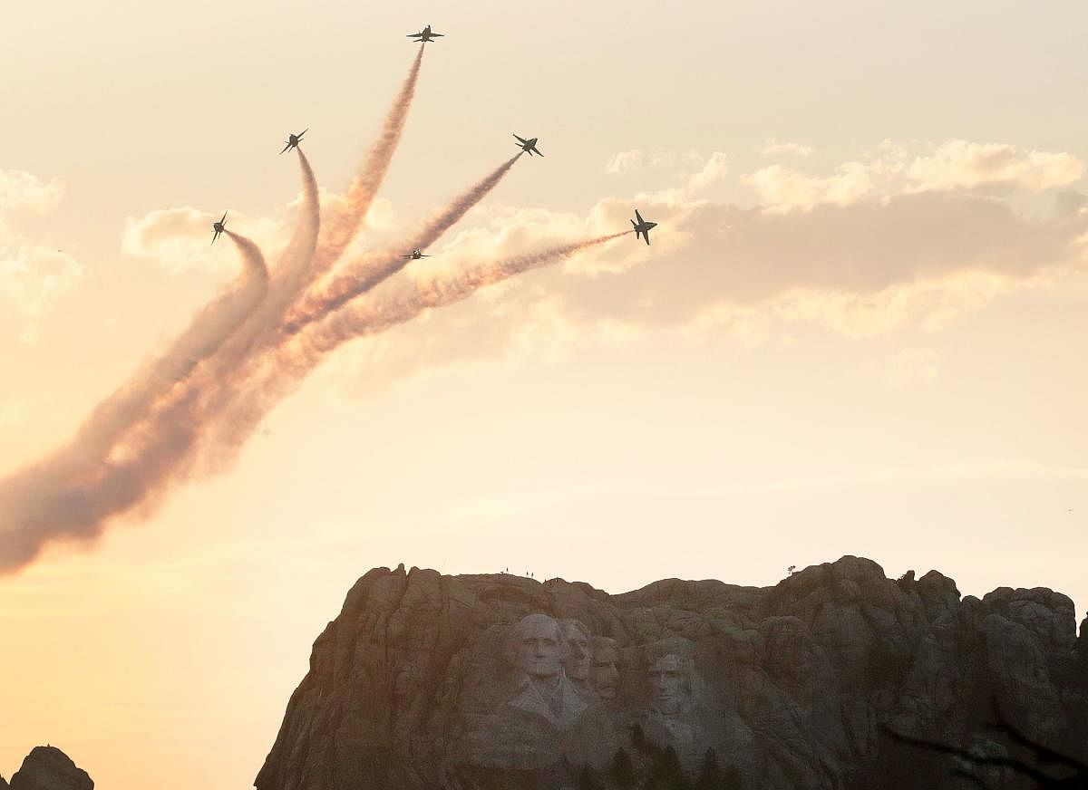 The US Navy Blue Angels fly past Mount Rushmore National Monument ahead of a large fireworks display on July 03, 2020 near Keystone, South Dakota. Scott Olson/Getty Images/AFP