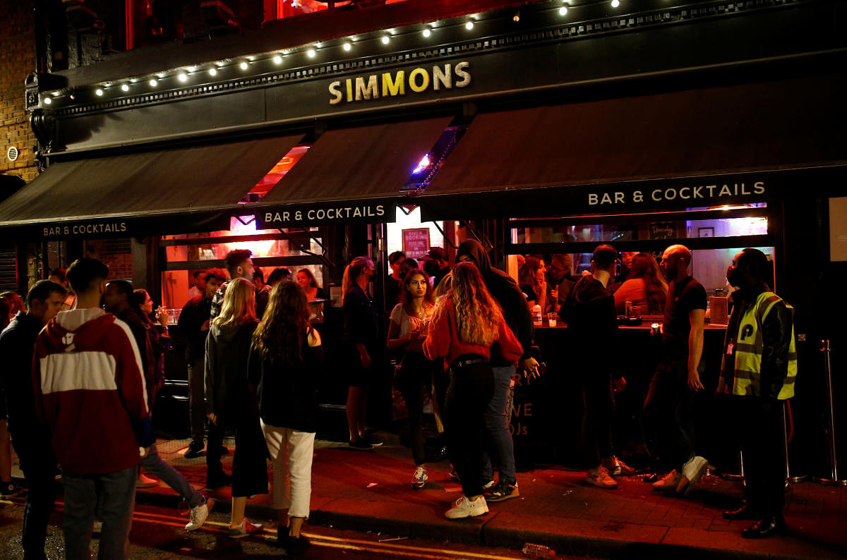 People gather in Soho, as restrictions are eased following the outbreak of the coronavirus disease (Covid-19), in London. Credit: Reuters