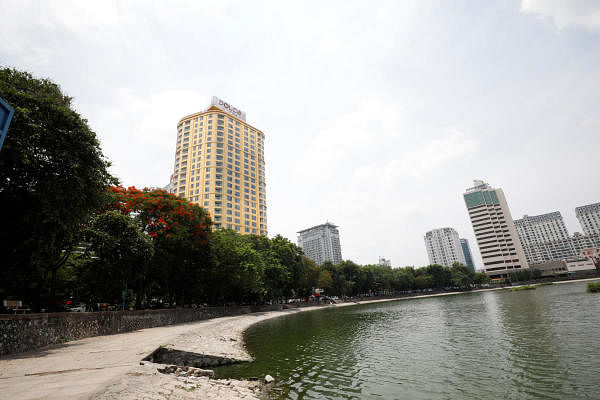 The hotel, owned by Hoa Binh Group and managed by US-based Wyndham Hotels & Resorts Inc, stands in stark contrast to its surrounding weather-worn Soviet-era buildings. Credit: Reuters Photo