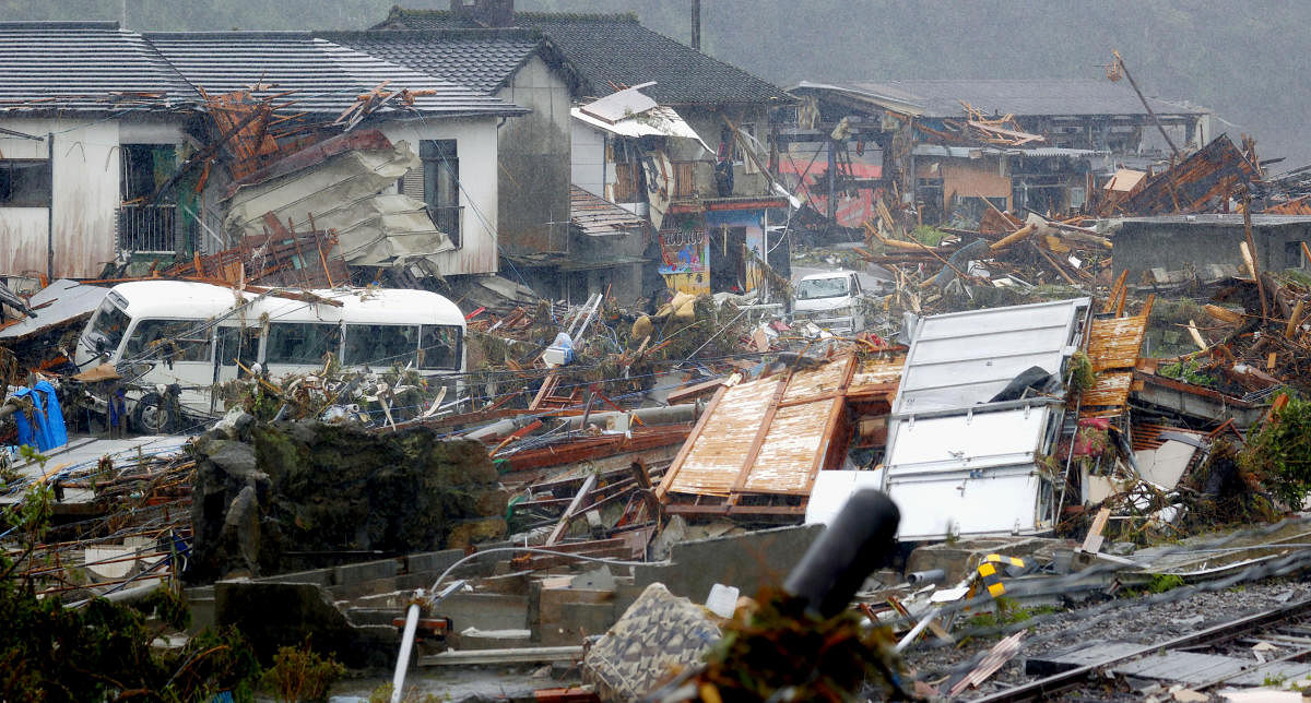 Debris is scattered at a residential area hit by heavy rain in Kumamura, Kumamoto prefecture, southern Japan Tuesday, July 7, 2020. Credit: Kota Endo/Kyodo News via AP