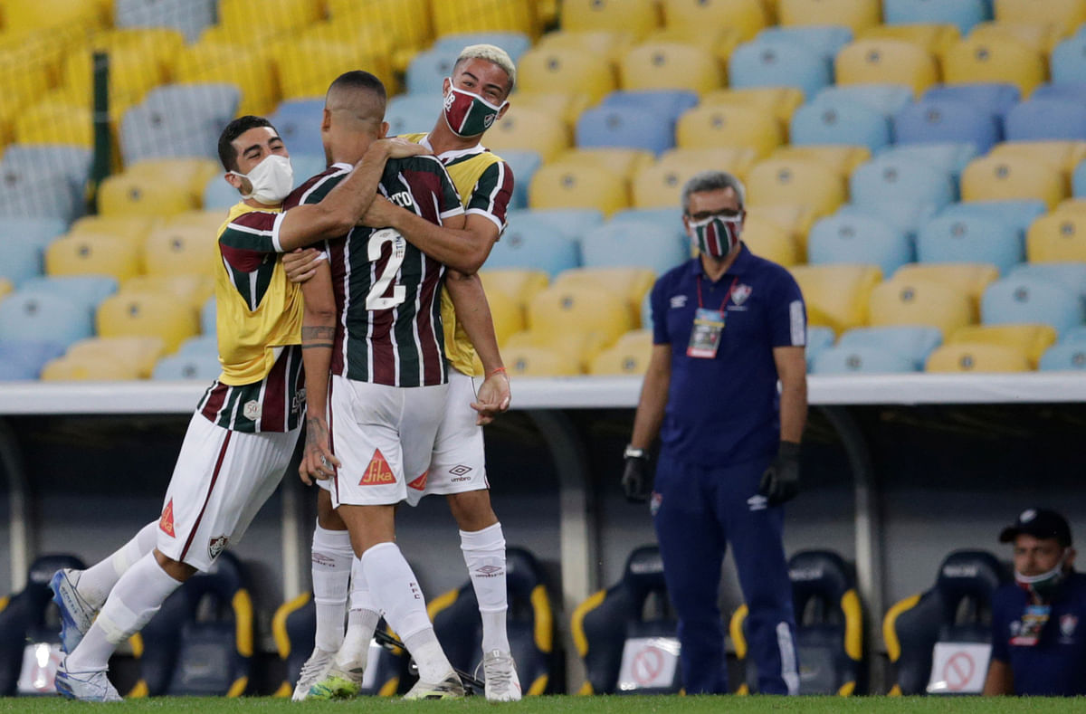 Fluminense's Gilberto celebrates scoring their first goal with teammates, following the resumption of play behind closed doors after the outbreak of the coronavirus disease. Credits: Reuters Photo